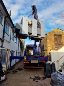 Removal of a Heidelberg SM 52 from a mews style premises in SW London